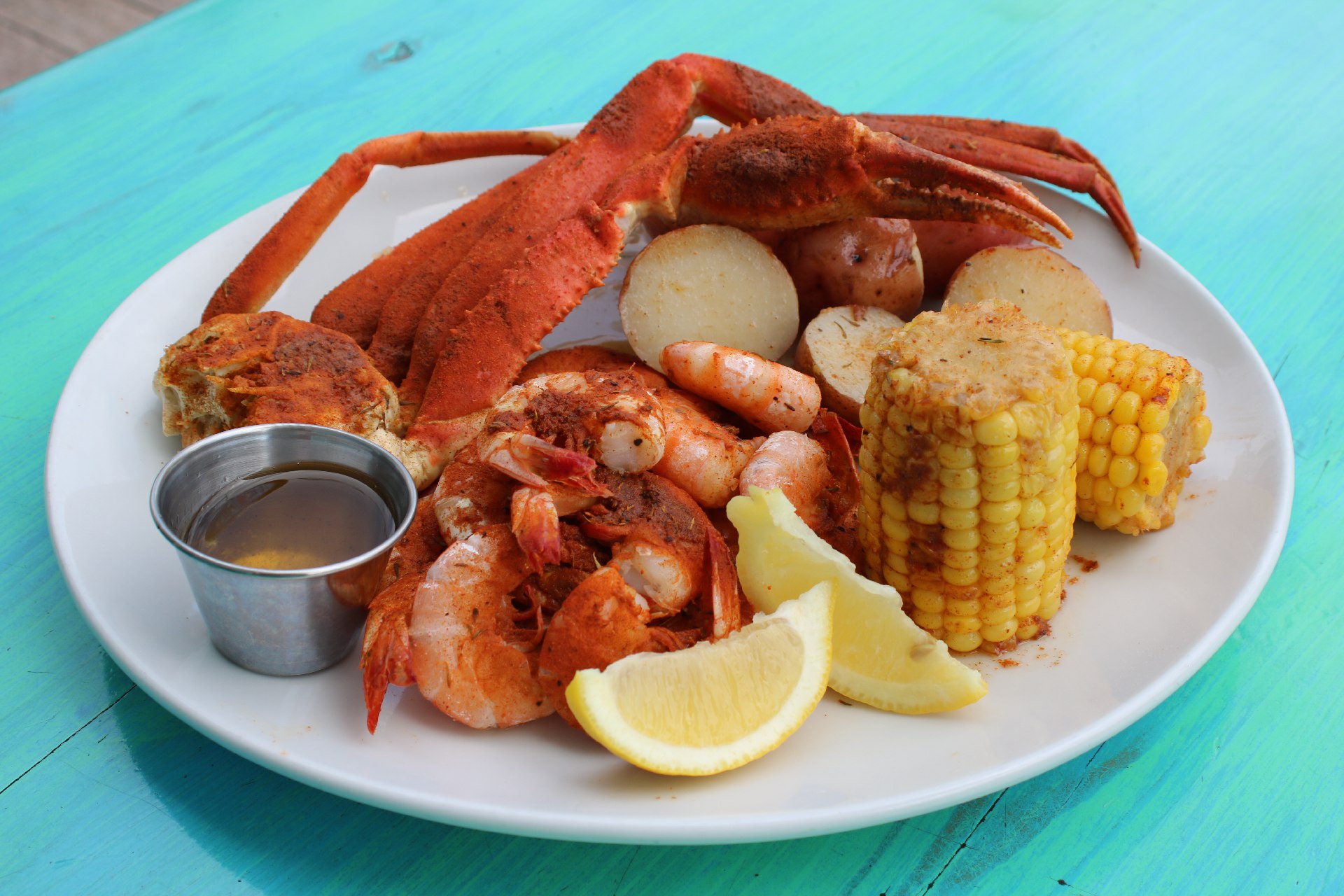 steamed seafood platter with corn